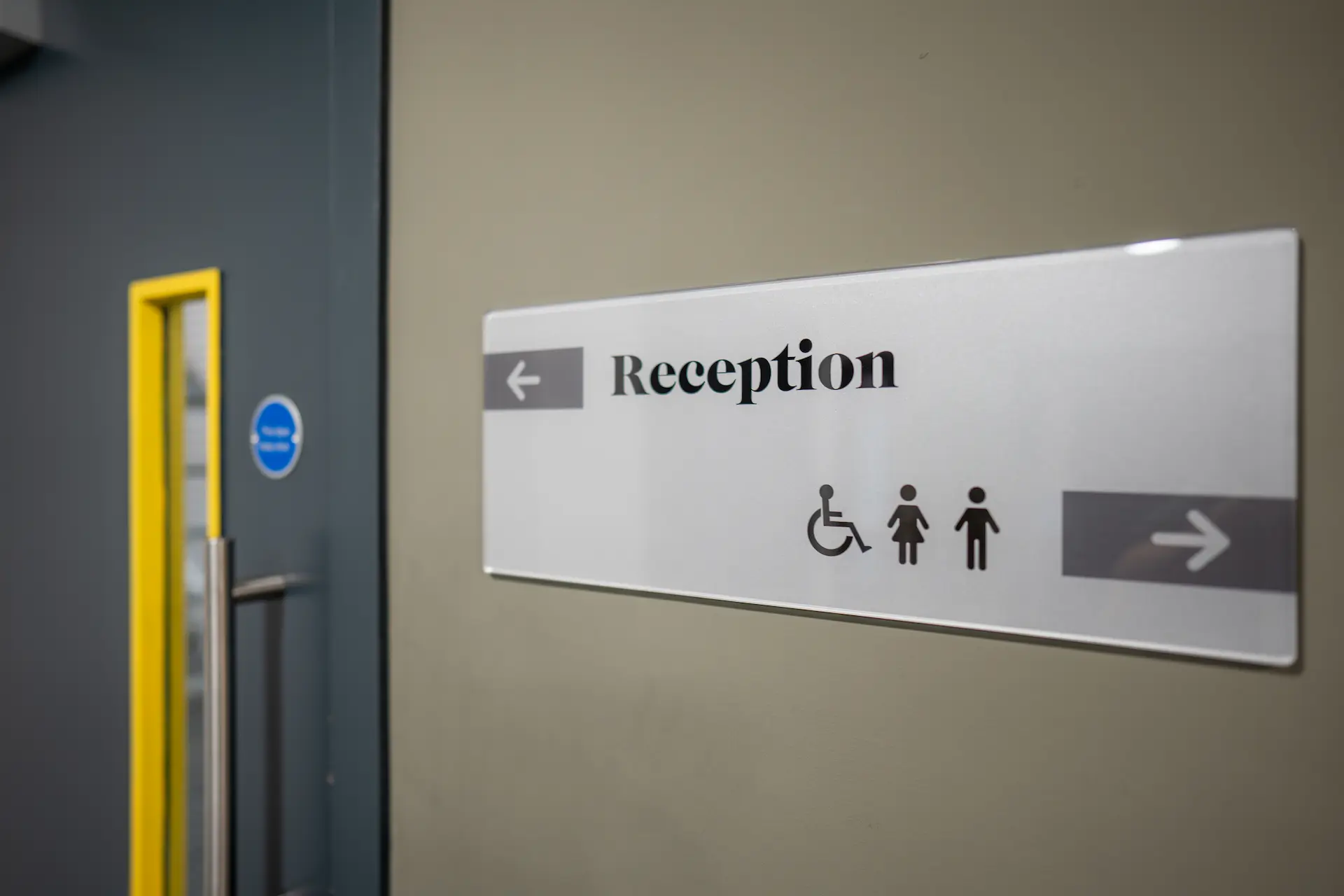 Sign pointing to Reception